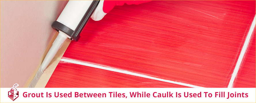 Picture of a Red Tile Floor with White Grout Lines and Caulking