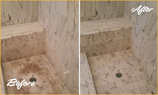 Before and After Picture of a Tanque Verde Marble Shower Honed to Remove Dark Stains