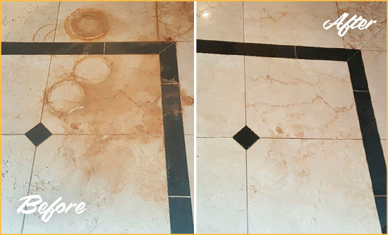 Before and After Picture of a Picture Rocks Hard Surface Restoration Service on a Marble Floor to Eliminate Rust Stains